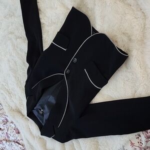 Gorgeous black blazer with checkered trimming